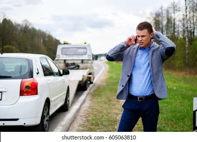 TK Roadside driver responding to a stranded motorist on a Dallas-area roadside